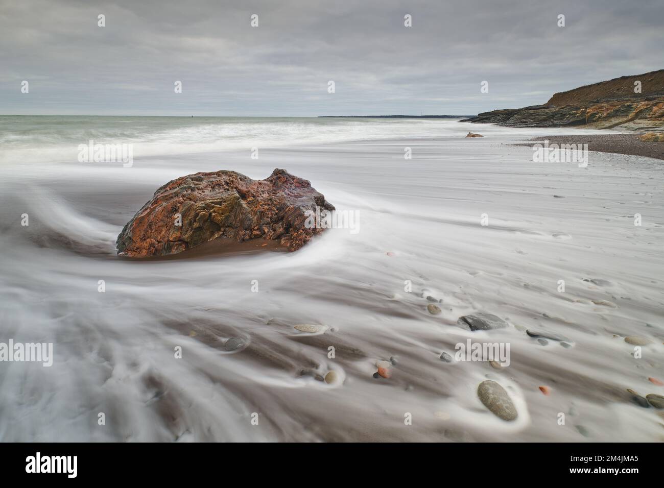 Surf washing on shore at Table Head Beach in Glace Bay a head of a