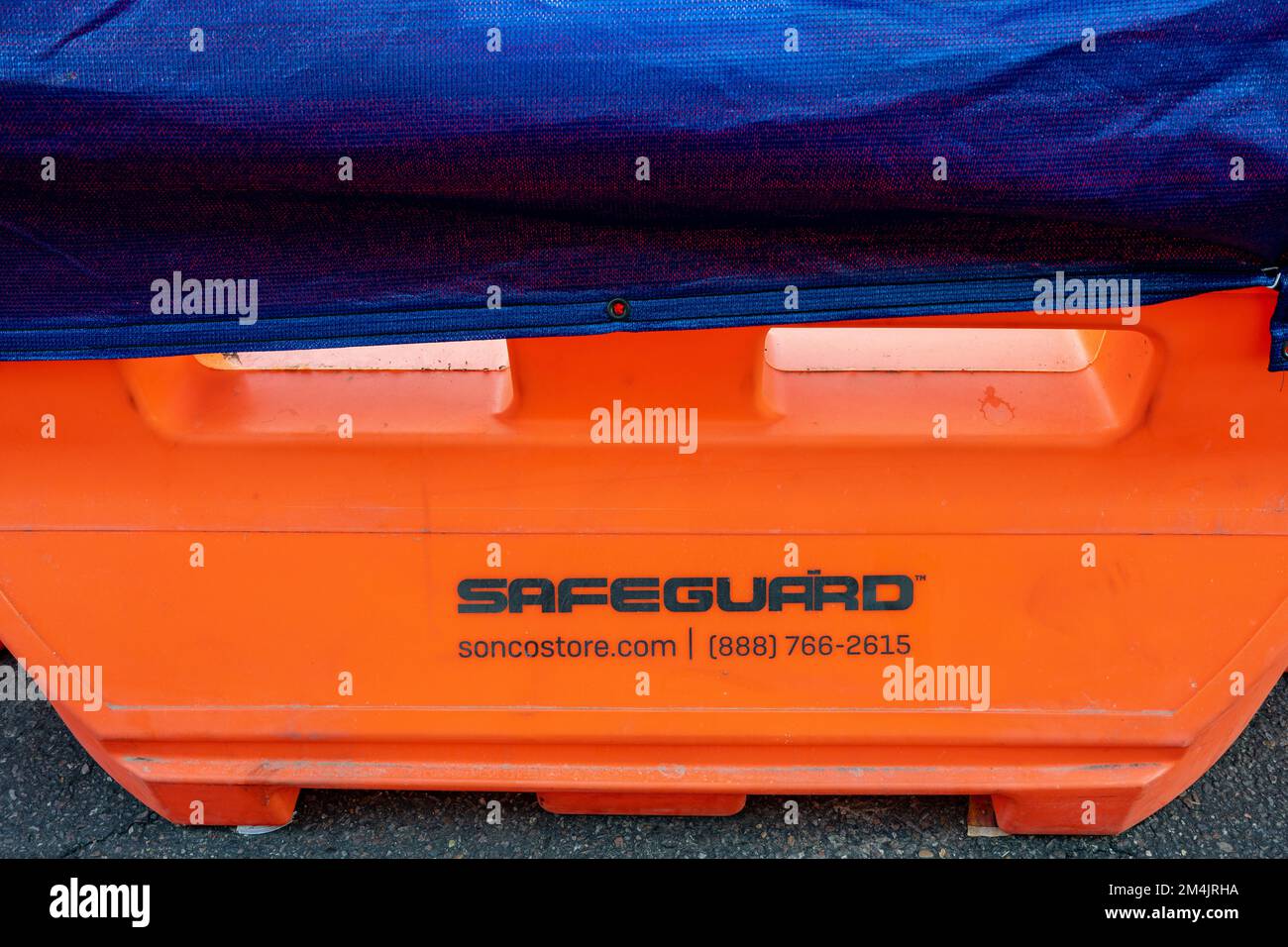 Phoenix, AZ - Nov. 11, 2022: Sonco's Safeguard is a water filled jersey barrier for traffic control at construction sites and work zones made of  high Stock Photo