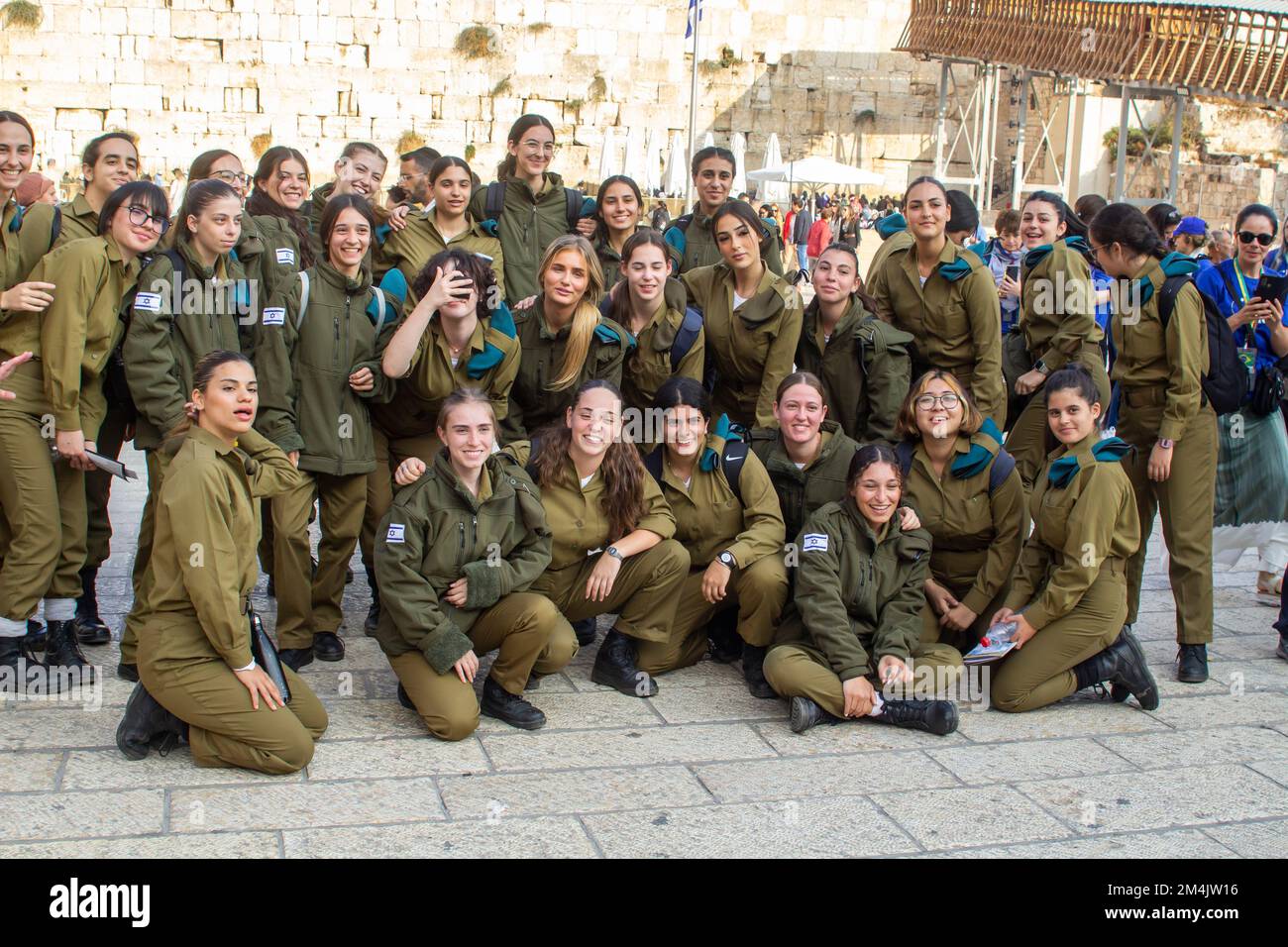 10 Nov 2022 A large group of young female Israeli army conscripts pose for a photograph near the Temple Mount in Jerusalem Israel Stock Photo