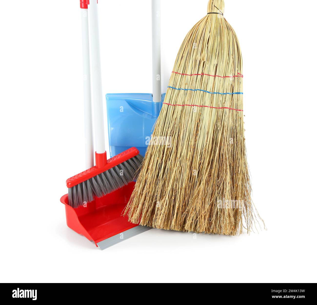Dustpans and brooms isolated on white background Stock Photo Alamy