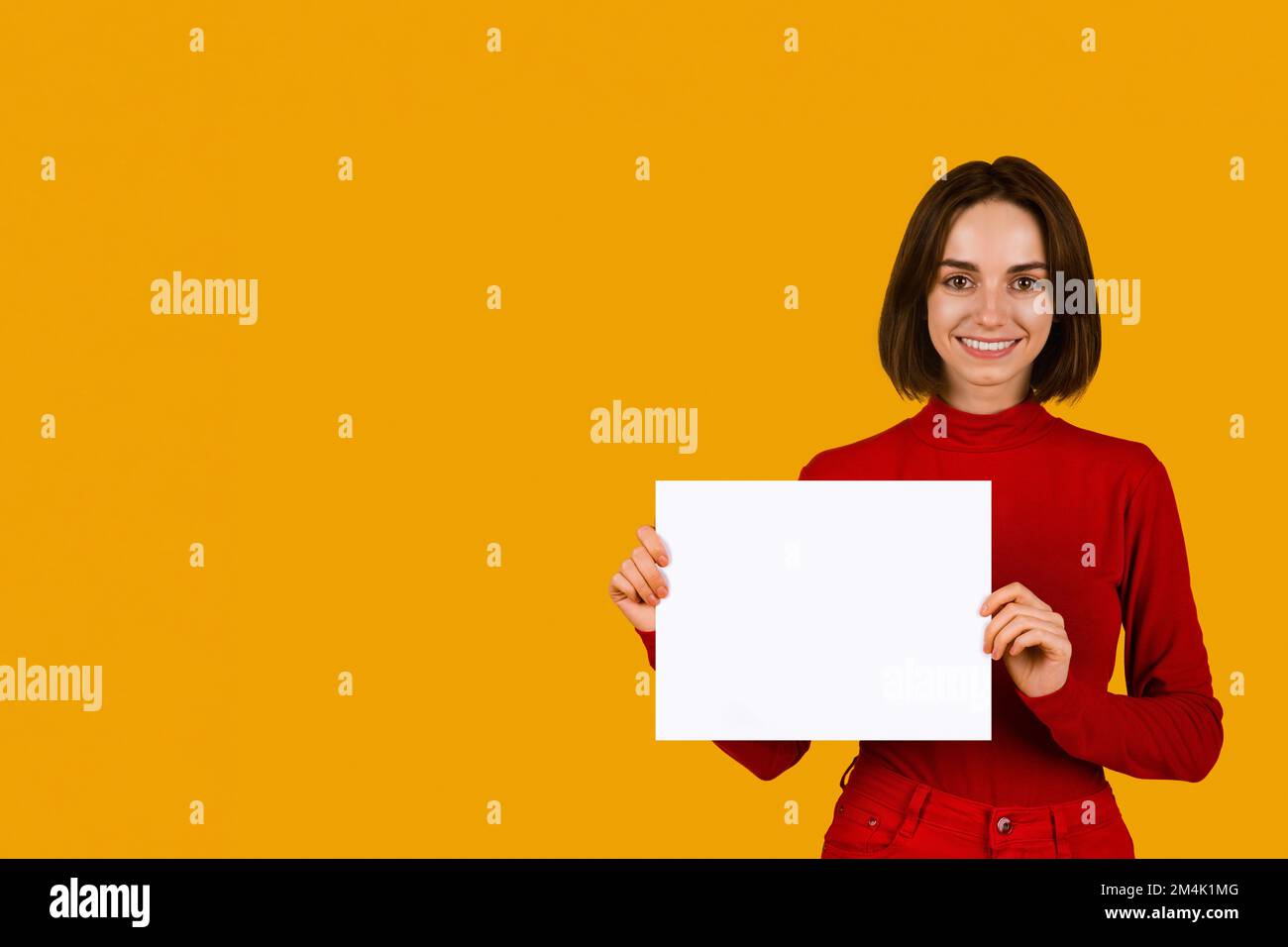 Excited woman showing empty hi-res stock photography and images - Alamy