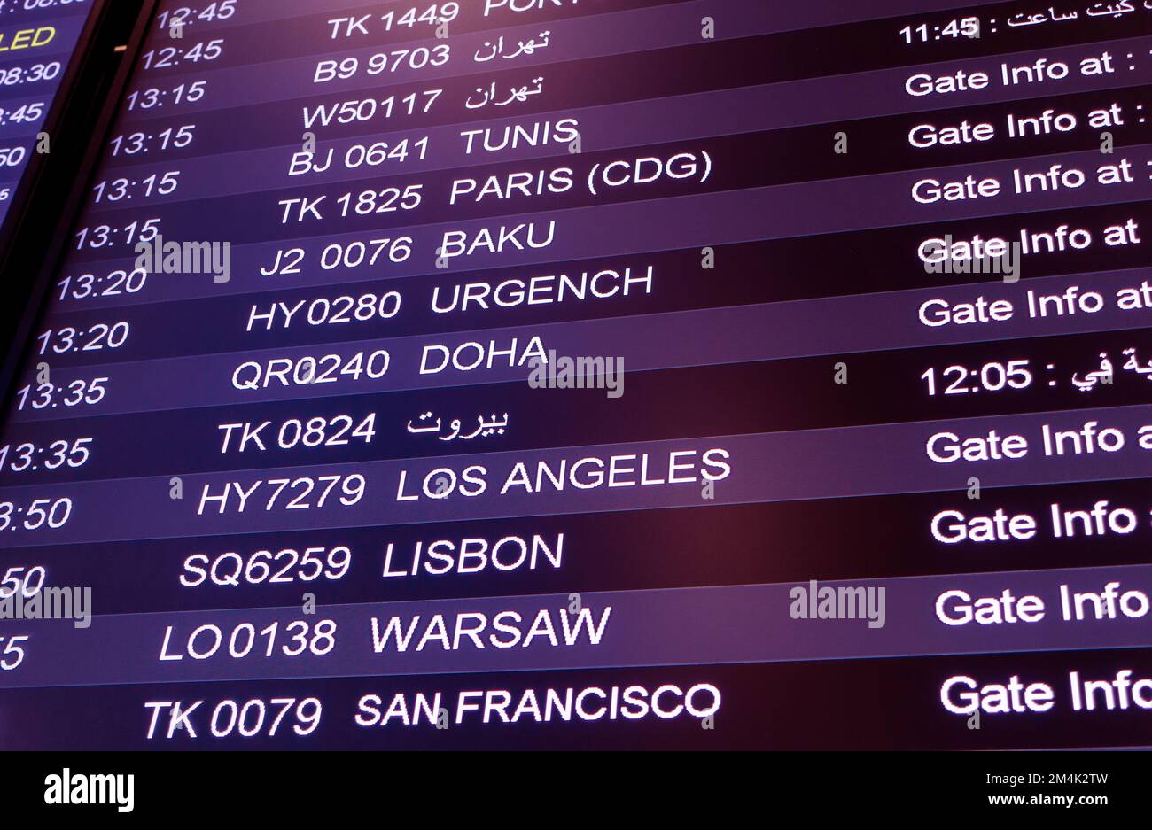 Display in international airport, info screen with flights and cities