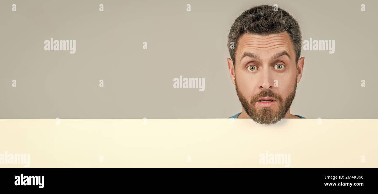 Man face portrait, banner with copy space. amazed male behind black ...