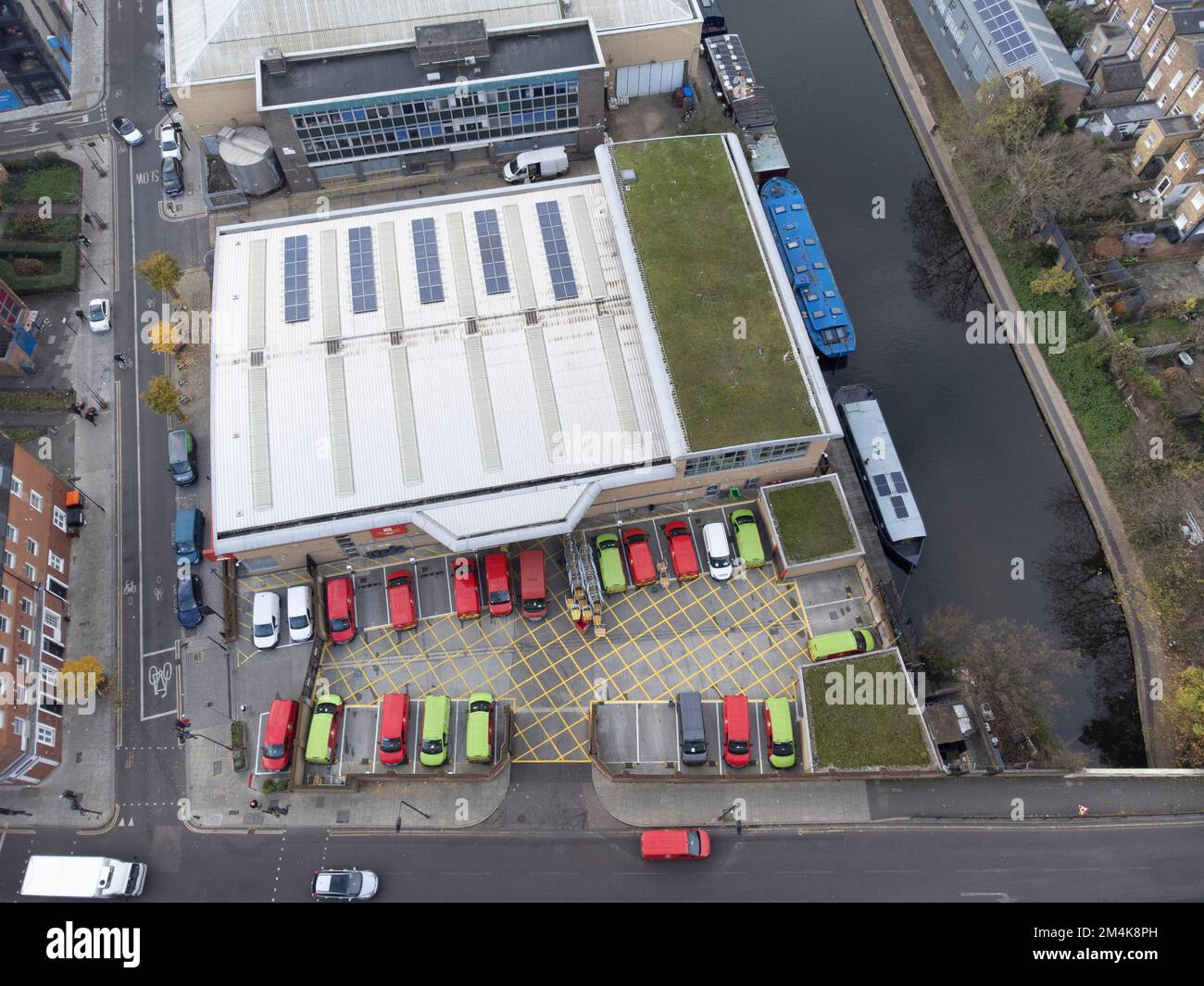 Mail delivery vans are parked at Royal Mail Islington Delivery Office