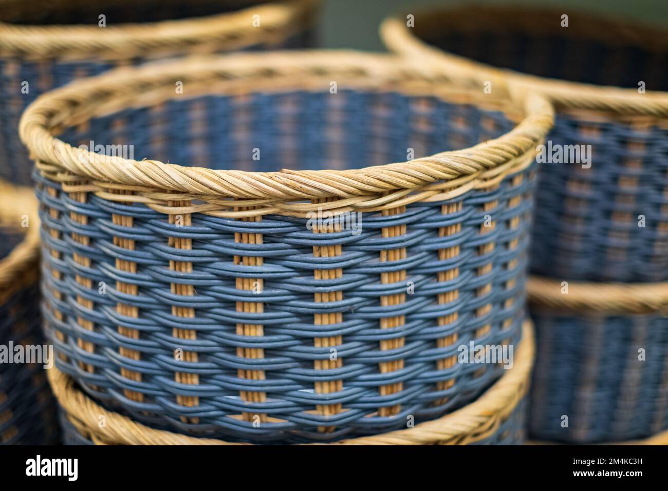 Collection of blue handmade rattan baskets. Handmade wicker basket Made