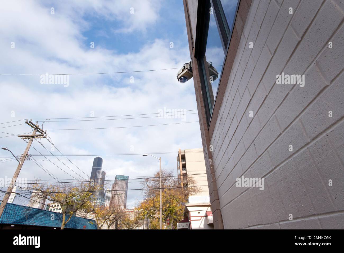 Surveillance camera looking down on city street. Stock Photo