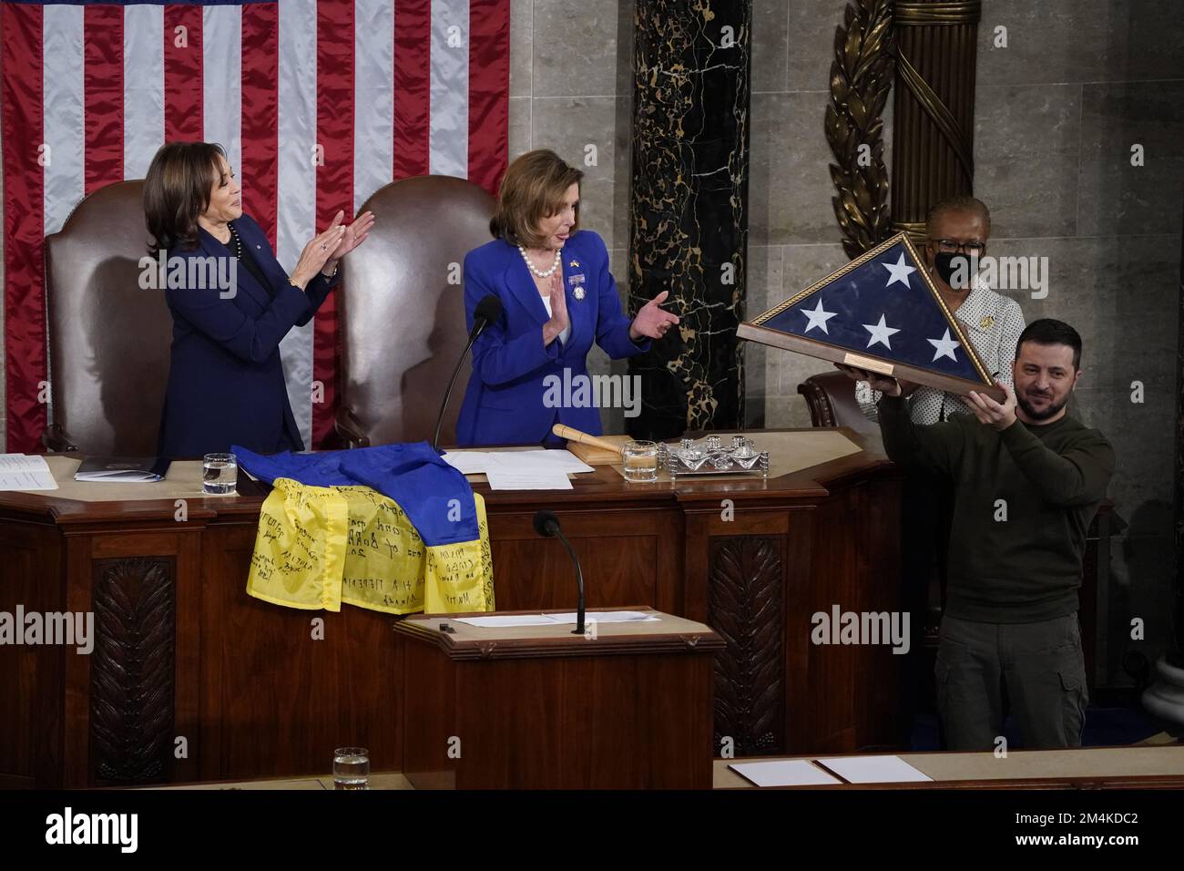 Washington, United States. 21st Dec, 2022. House Speaker Nancy Pelosi gives Zelensky a folded US flag that had flown over the Capitol building on Wednesday after President Volodymyr Zelensky delivered critical remarks at a Joint Session of Congress on Capitol Hill December 21, 2022 in Washington DC. Photo by Ken Cedeno/Sipa USA Credit: Sipa USA/Alamy Live News Stock Photo