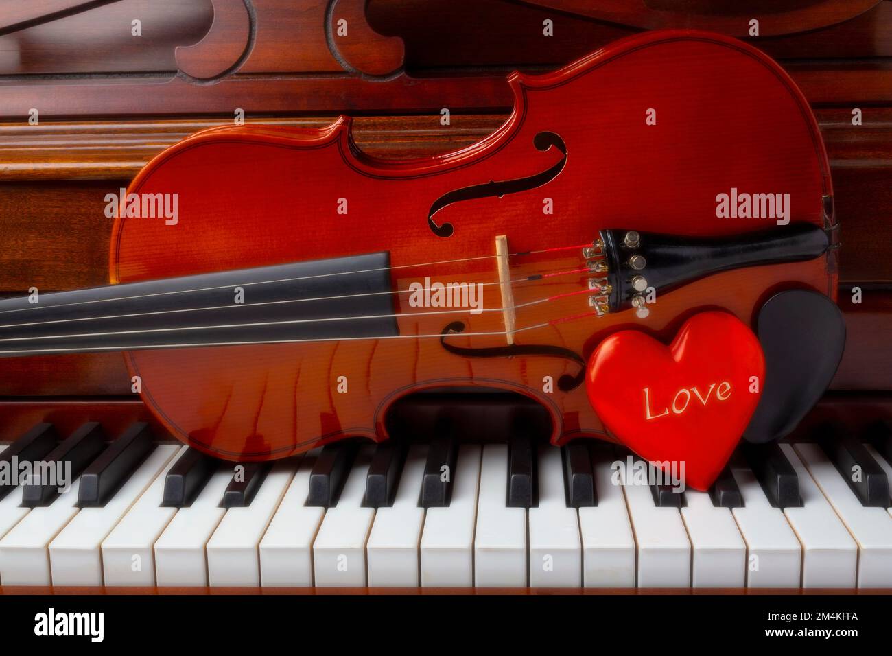 Violin And Red Love Heart On Piano Keyboard Still Life Stock Photo - Alamy