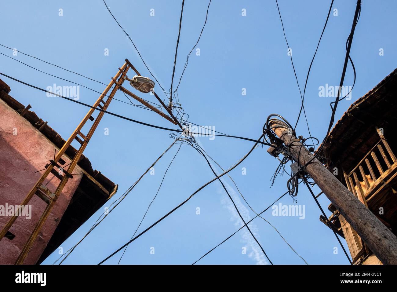 Old electricity and telephone poles seen in the neighborhood. The