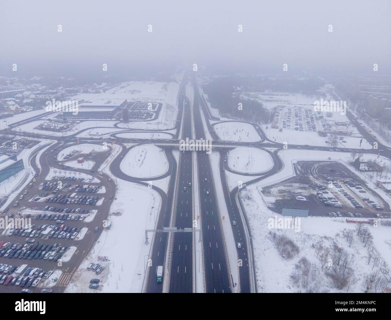 An aerial shot of interchange roads in Kaunas Lithuania covered with snow in winter Stock Photo