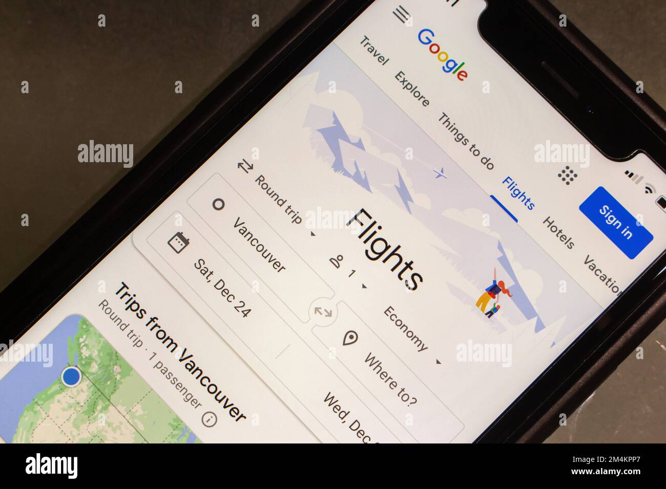 Website of Google Flights, an online flight booking search service for the purchase of airline tickets through third-party suppliers, seen in iPhone Stock Photo