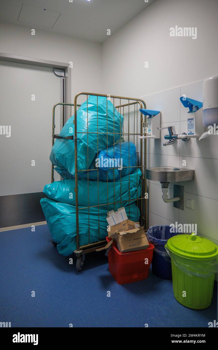 many garbage bags pile up in a storage room in the operating room Stock