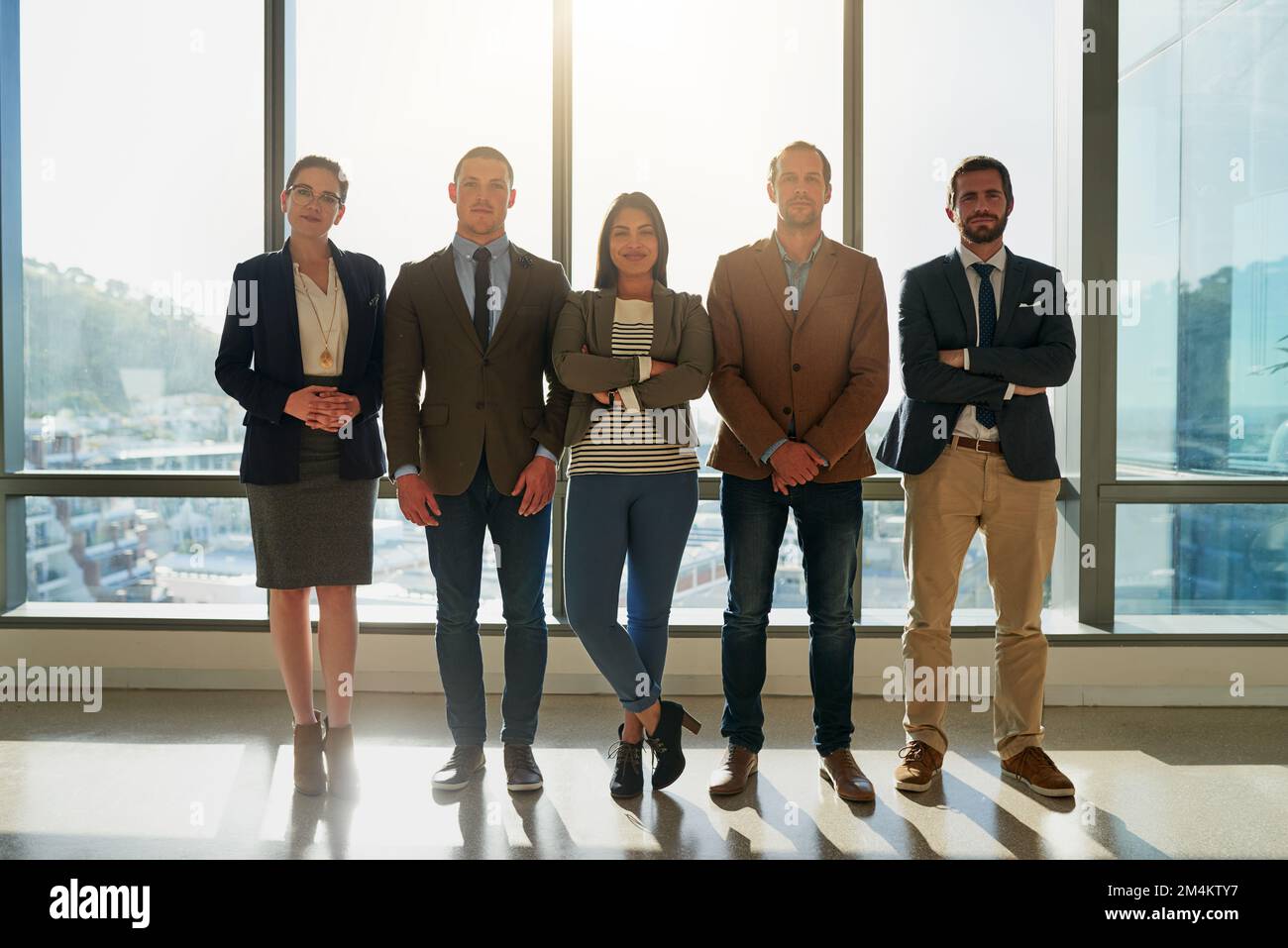 We are the best in the business. Full length portrait of a group of ...