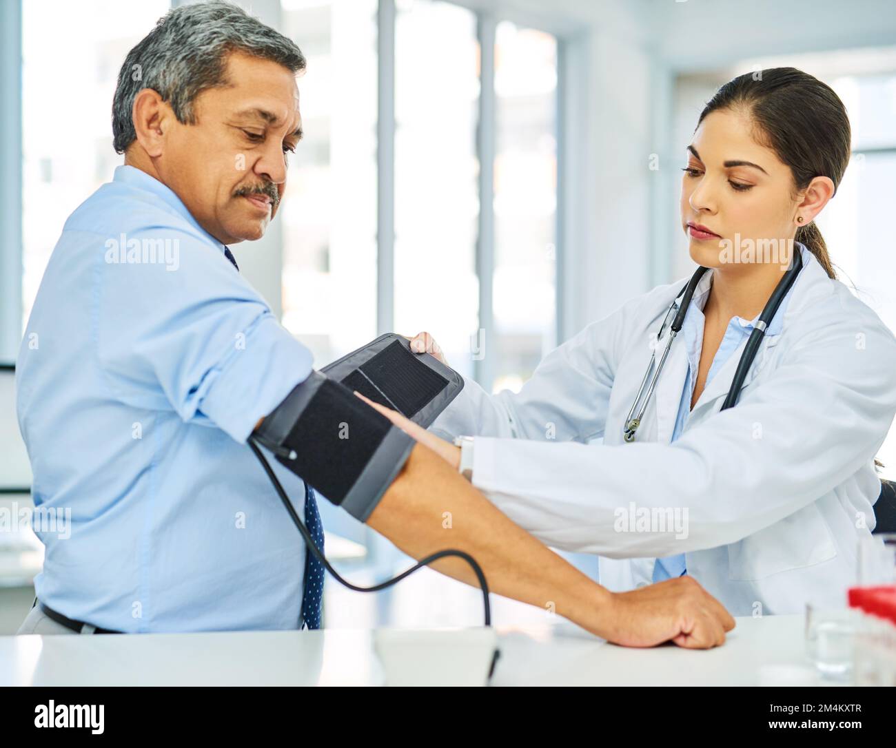 Getting his routine examination to ensure all is in check. a doctor