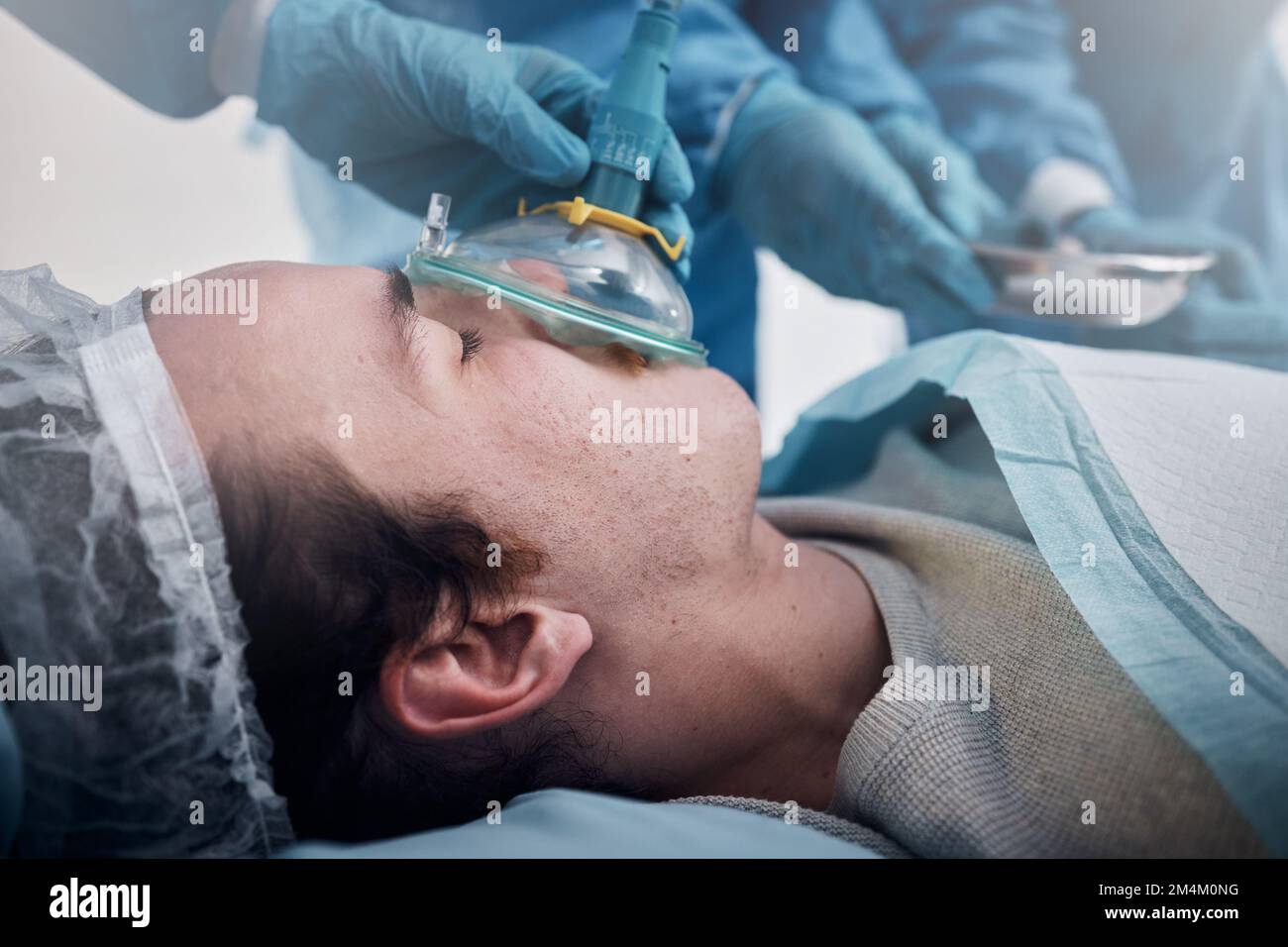 Anesthesia, oxygen mask and medical with man in surgery for breathing