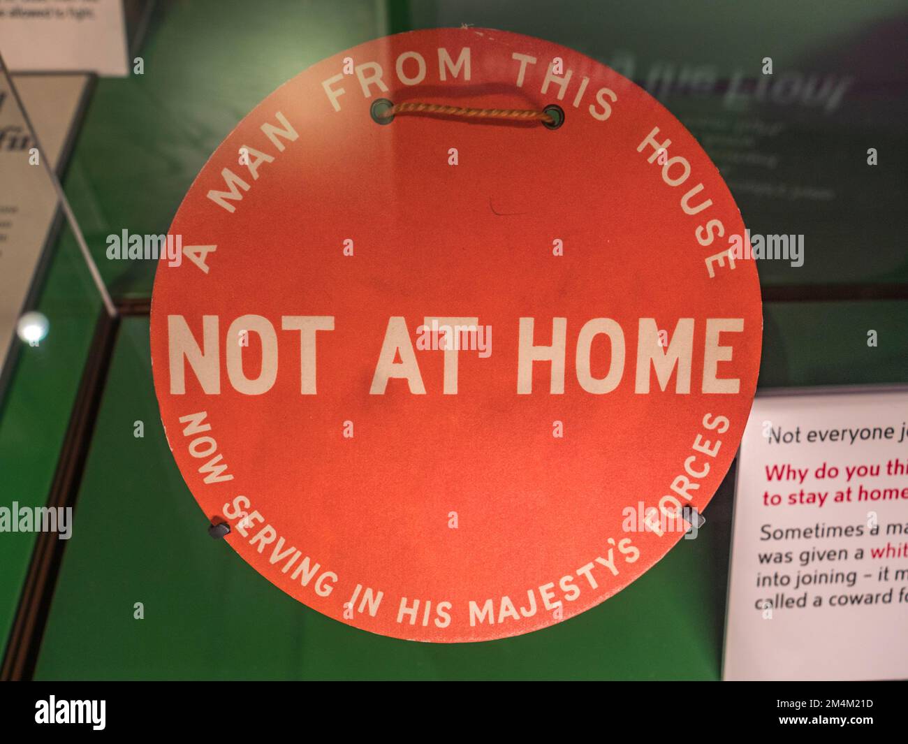 A 'Not At Home' disc displayed during WWI in the window to shame neighbours with no relatives fighting, Imperial War Museum, London, UK. Stock Photo