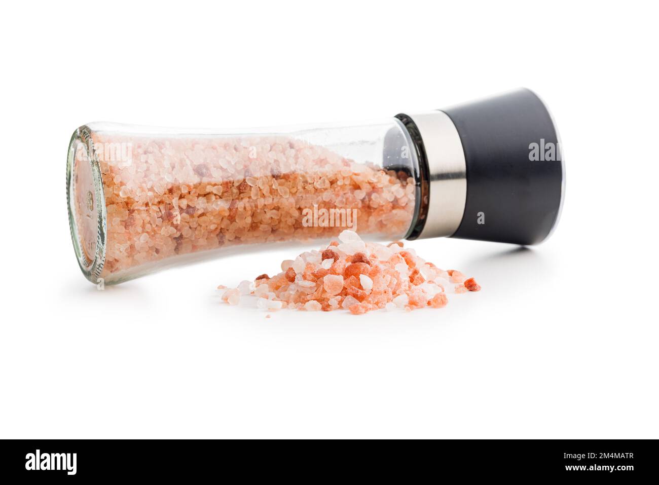 Pink himalayan salt and salt mill isolated on the white background. Stock Photo