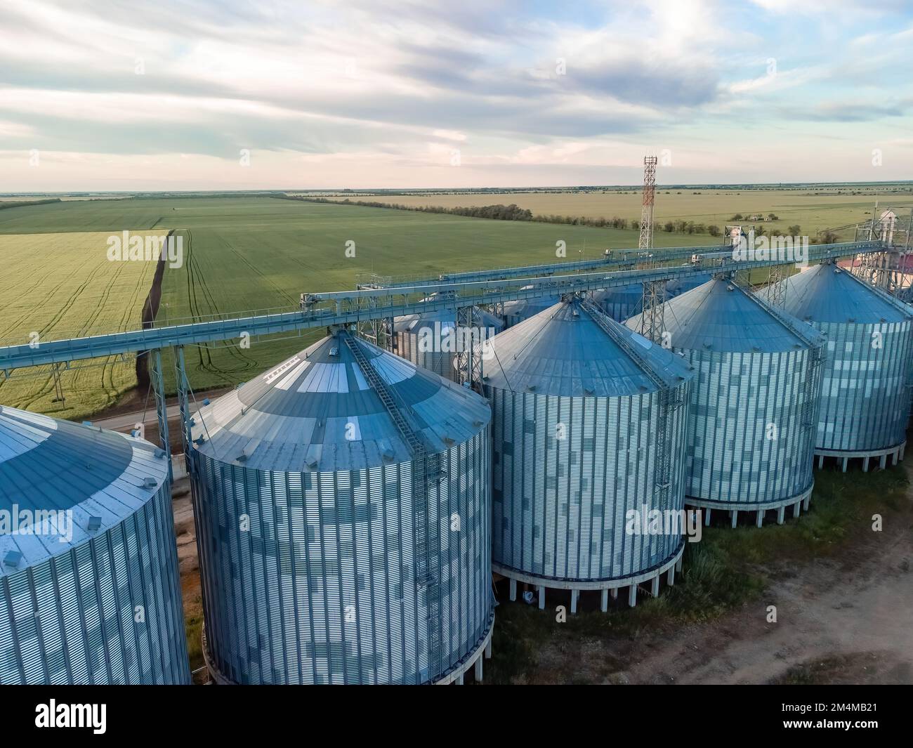 Grain elevator. Metal grain elevator in agricultural zone. Agriculture