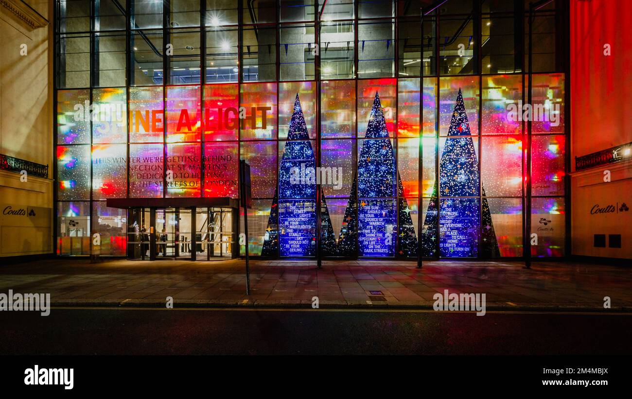 Colourful 'Shine A Light' Coutts Bank decorated for the festive season. Stock Photo