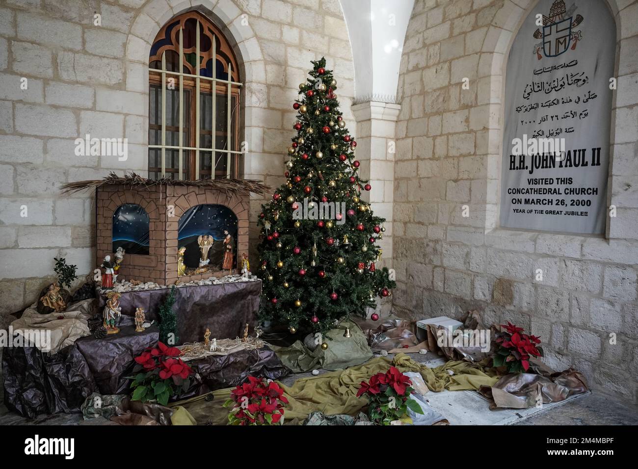 Jerusalem, Israel. 22nd Dec, 2022. A Christmas installation adorns the entrance to the Latin Patriarchate of Jerusalem in the Old City's Christian Quarter. Credit: Nir Alon/Alamy Live News Stock Photo