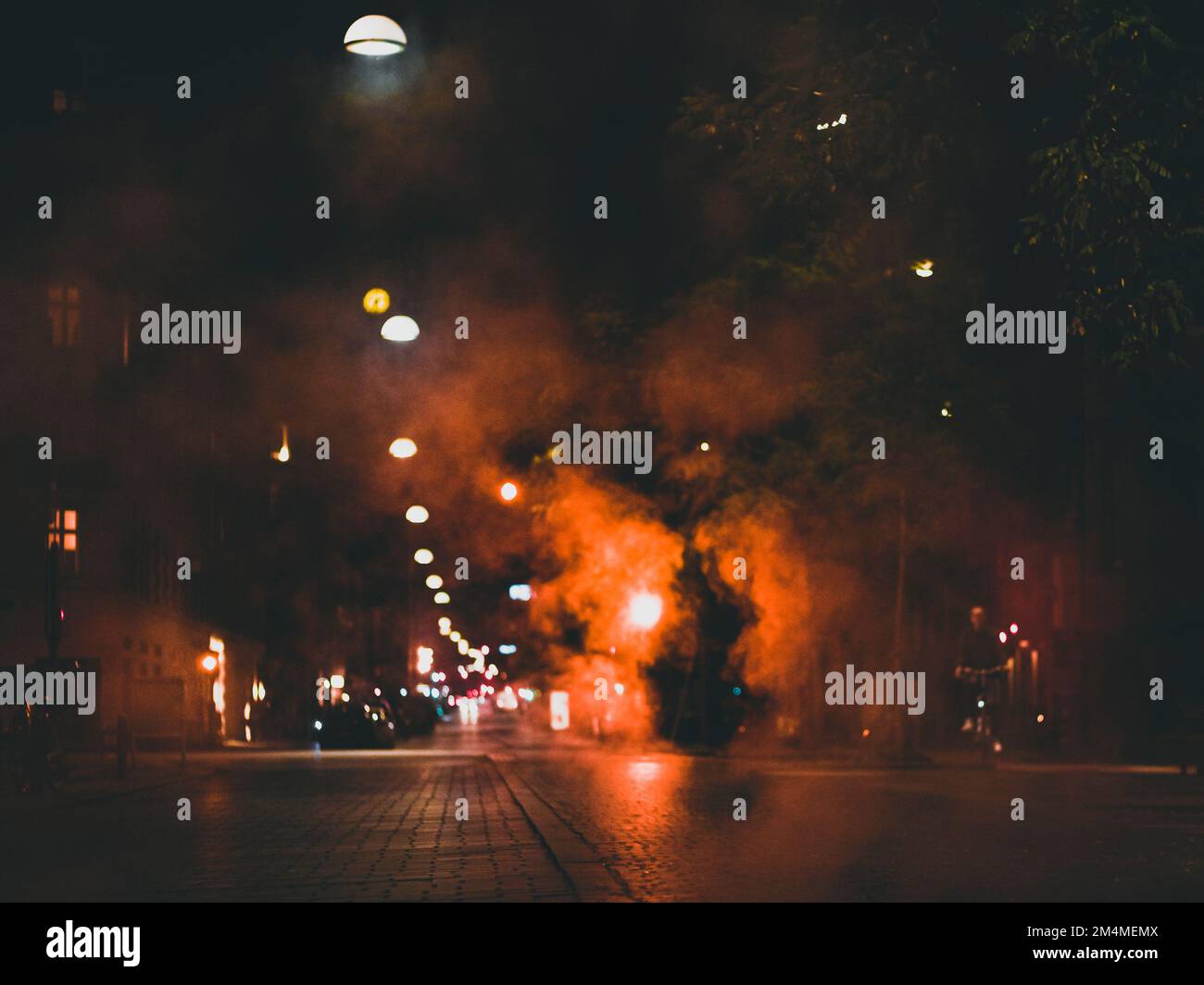 steam over night city street Stock Photo