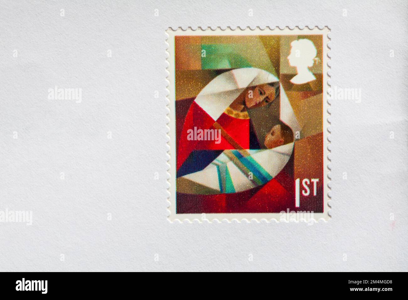 1st class Christmas stamp stuck on white envelope 2022 Stock Photo