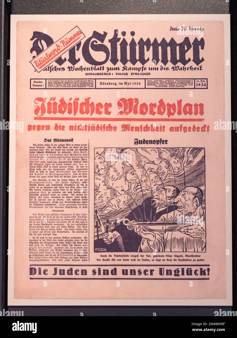 'Der Stürmer' (The Striker') with anti-semitic front page in May 1934 a weekly German tabloid-format, Imperial War Museum, London, UK. Stock Photo