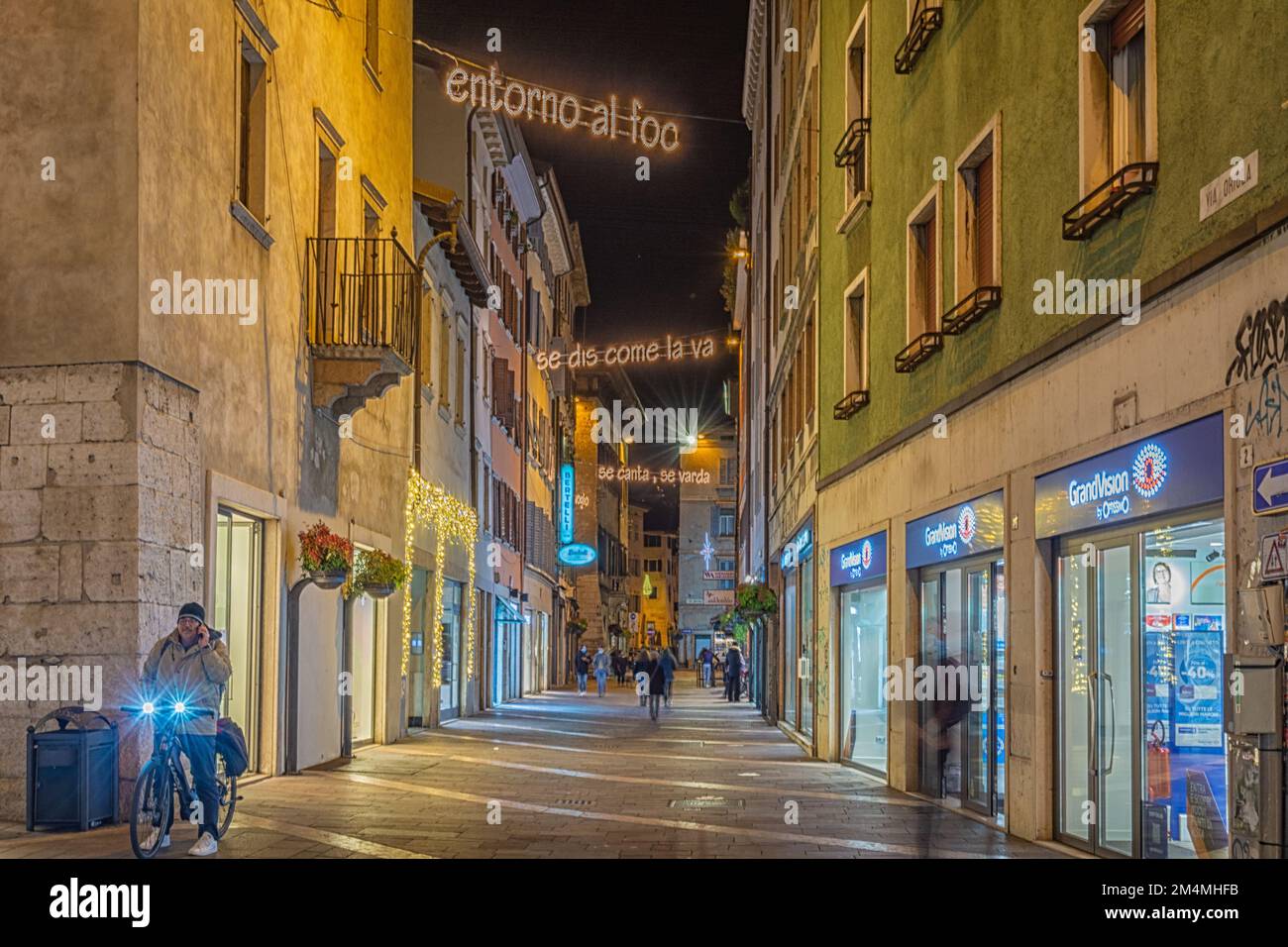 Trento street night with Christmas lighting - Trento -  Trentino Alto Adige, northern Italy - Europe. Urban scene Stock Photo