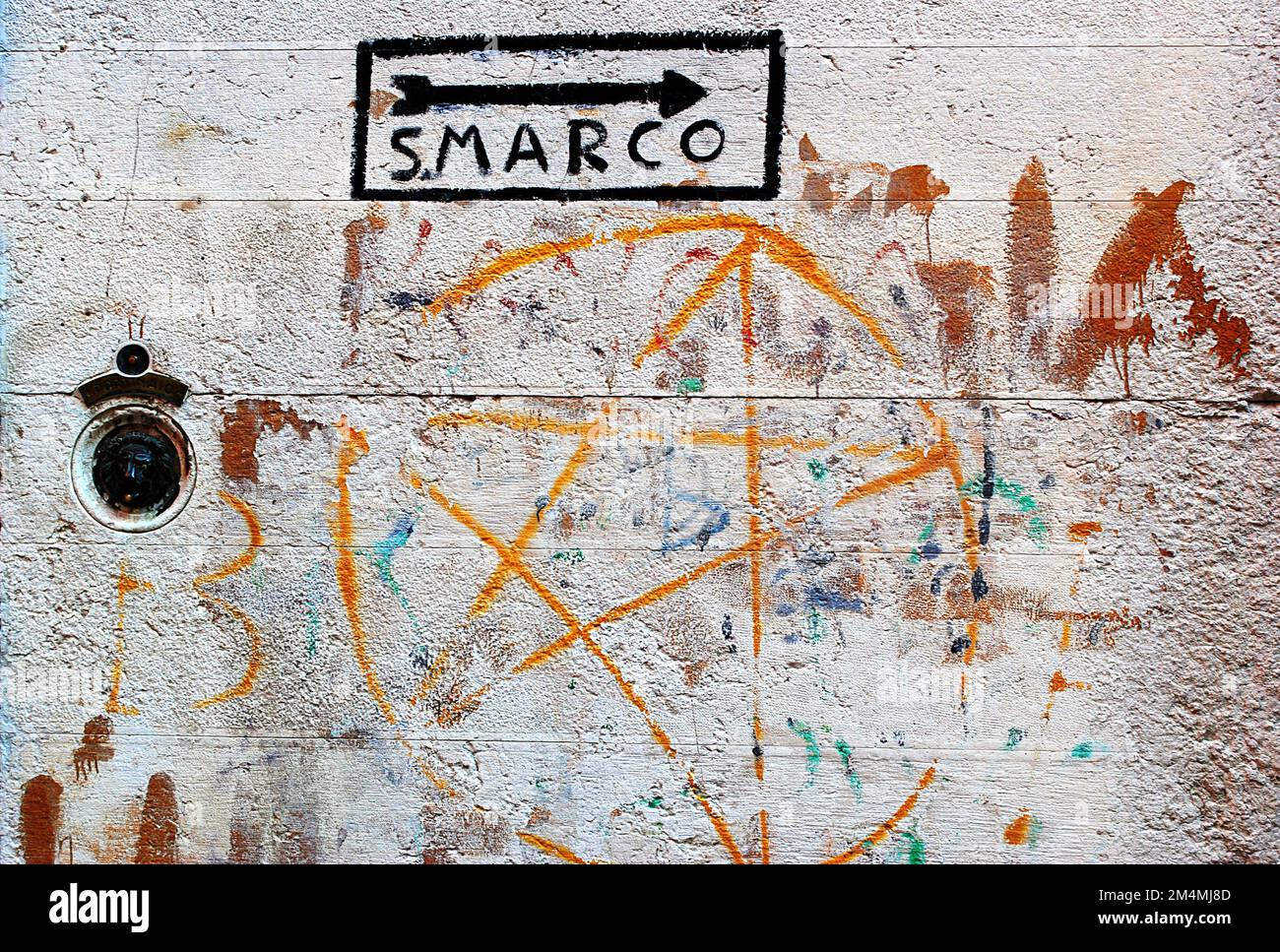 Venice, Italy - November 01th 2013: Paintings on the wall in Venice. Murales with directions for Piazza San Marco in the narrow streets of the centre Stock Photo