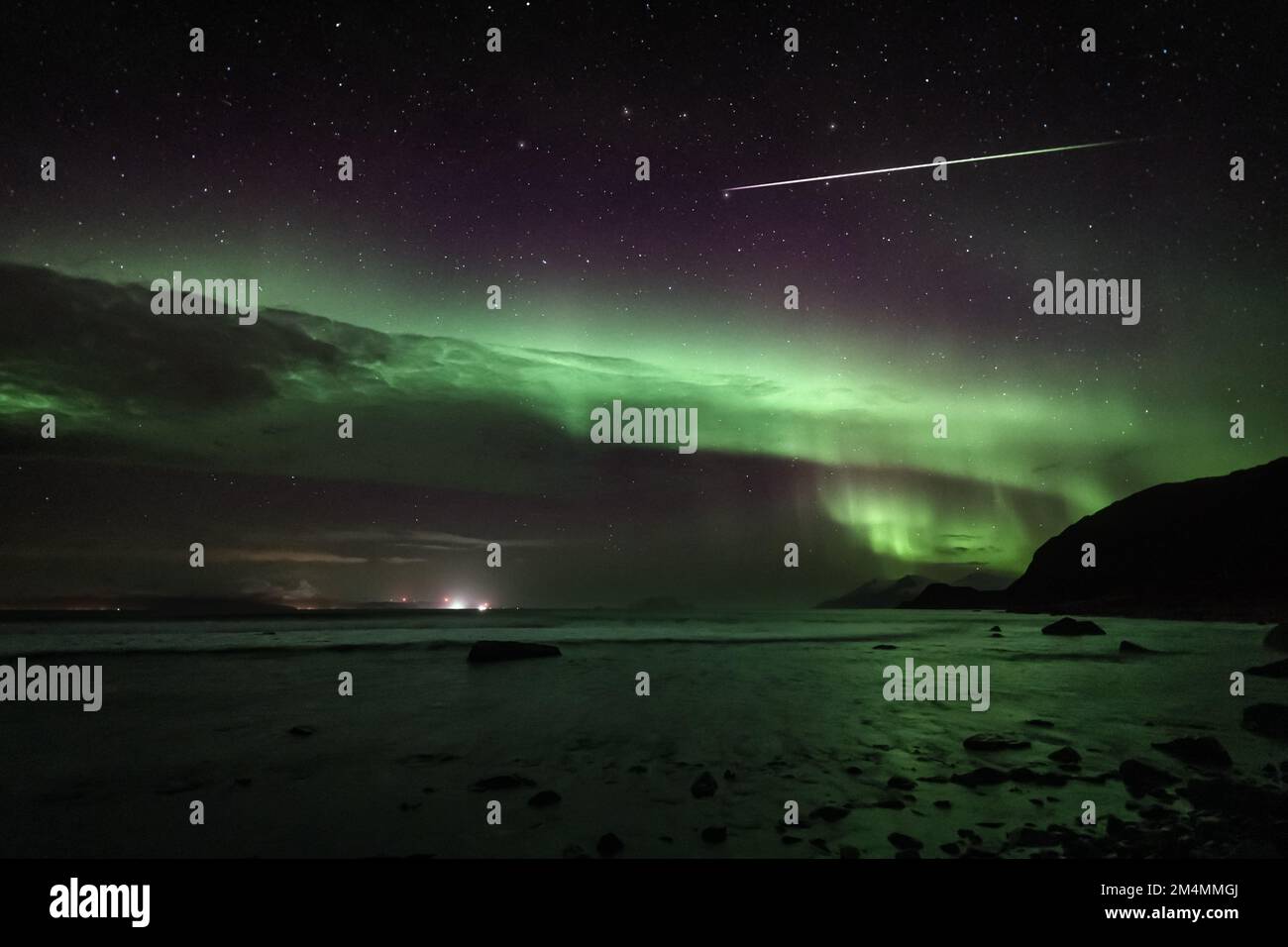 A breathtaking view of the Northern lights or aurora borealis in Troms ...