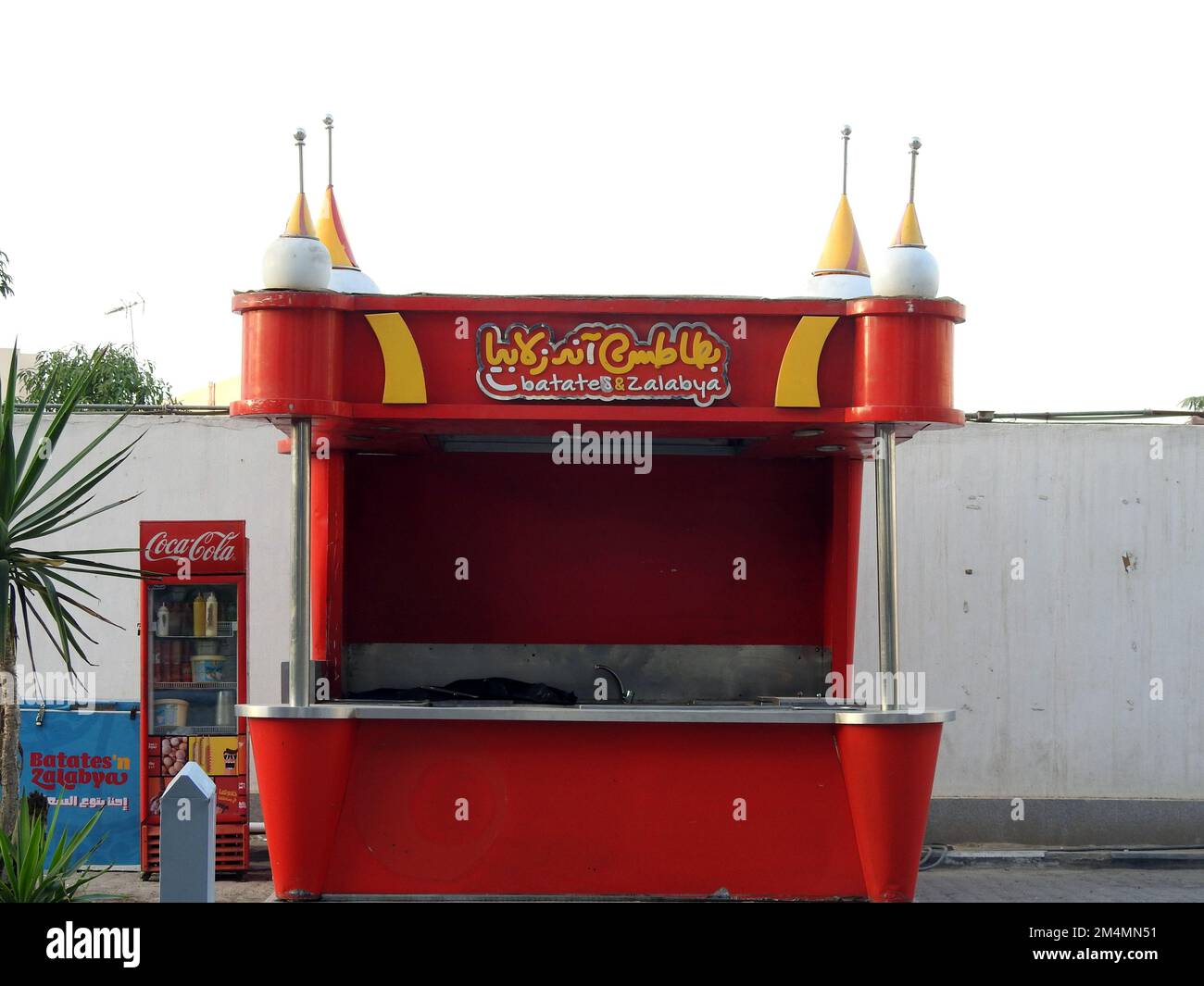 Cairo, Egypt, December 10 2022 Batates and Zalabya or potatoes and