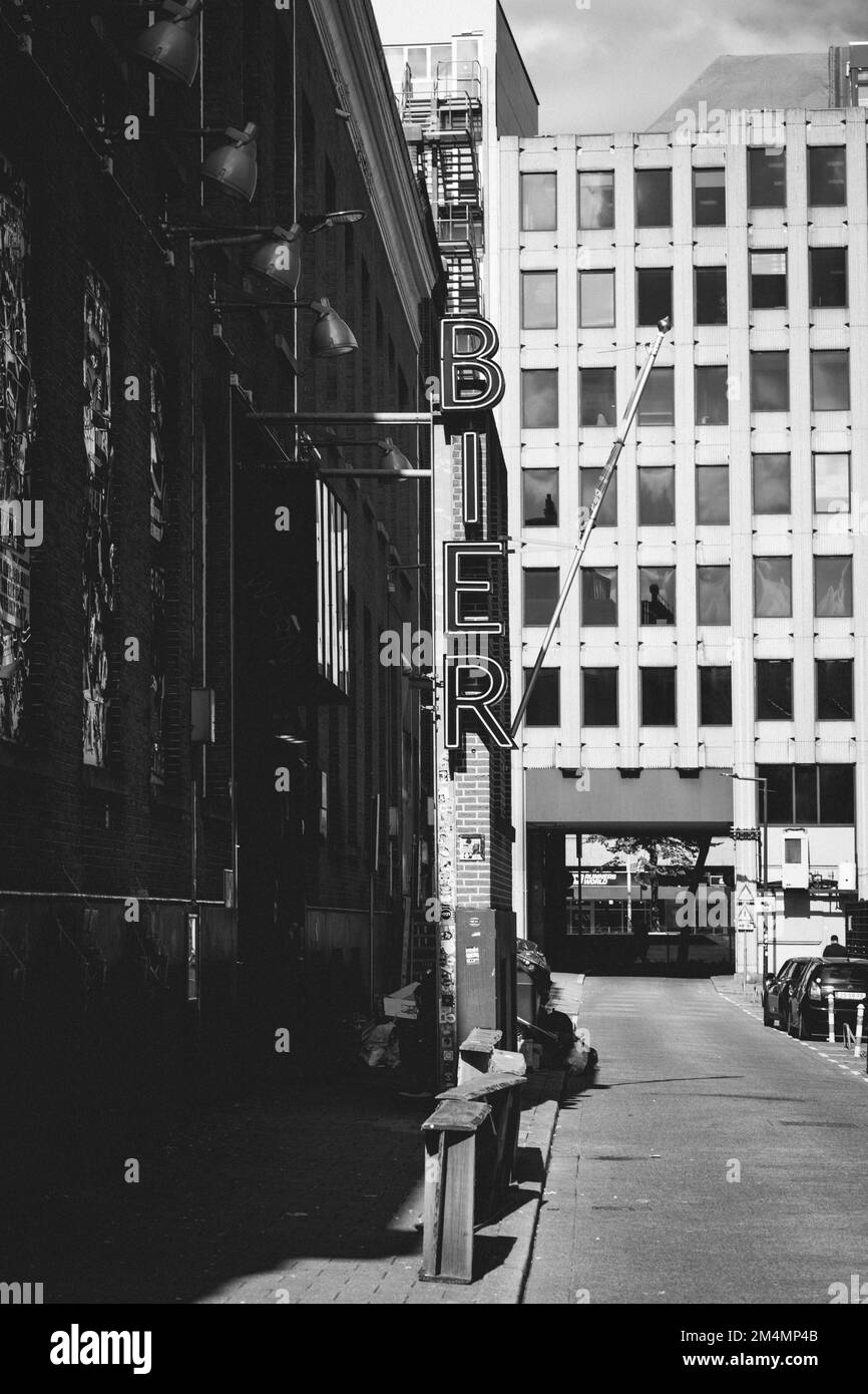 A vertical grayscale shot of the architecture of the modern city of ...
