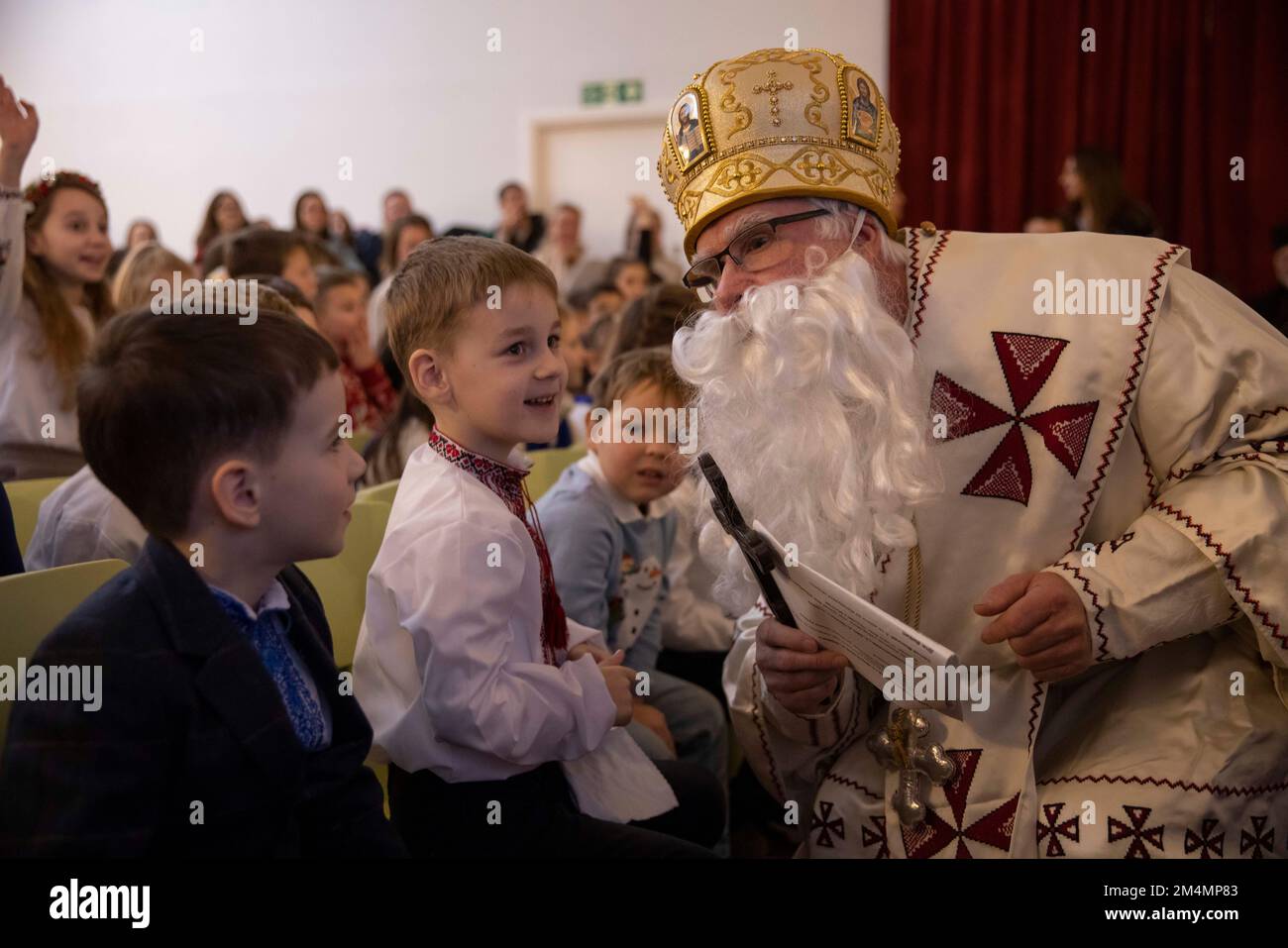 Ukrainian children take part in the festive service at the Ukrainian Catholic Cathedral, Sunday December 18th for the annual Feast of St. Nicholas. Stock Photo