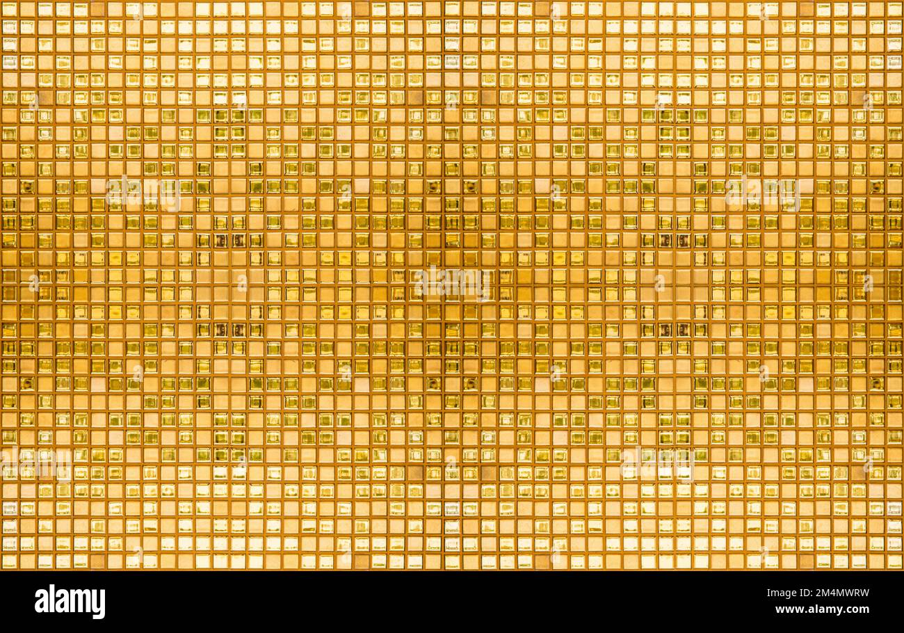 Luxury gold mosaic tiles background texture as background. Golden shiny