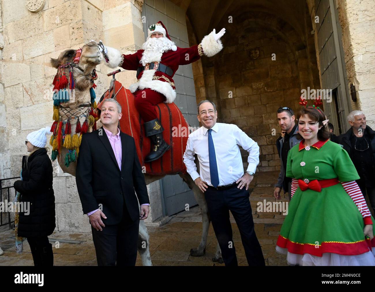Jerusalem, Israel. 22nd Dec, 2022. (R) U.S. Ambassador to Israel Thomas Nides holds hands with Issa Kassissieh, dressed as Santa Claus, outside the Jaffa Gate of Old City of Jerusalem, on Thursday, December 22, 2022, days before Christmas. Photo by Debbie Hill/ Credit: UPI/Alamy Live News Stock Photo