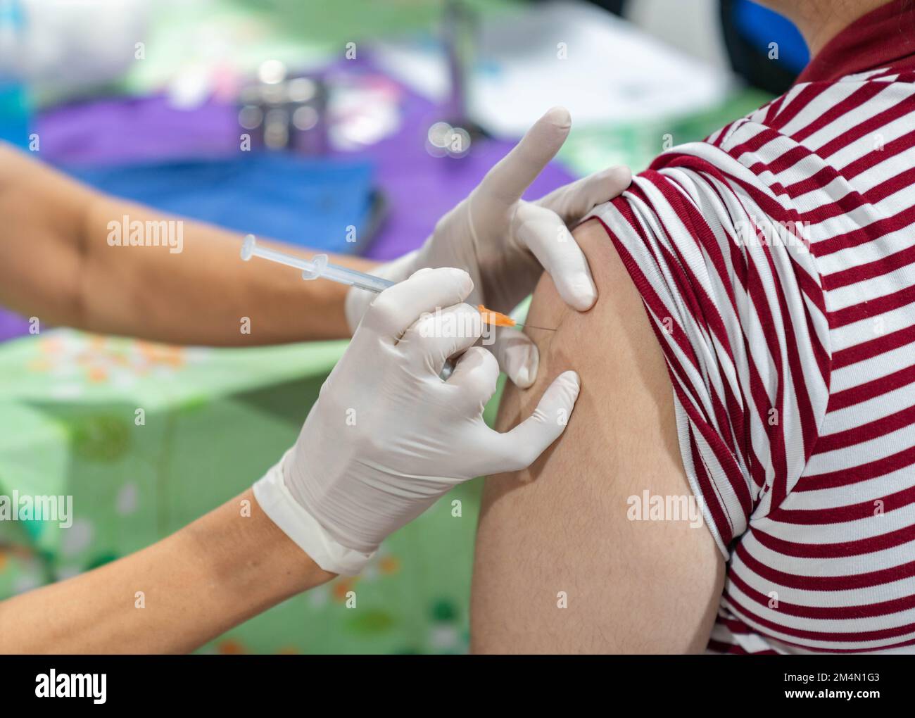 Male patient getting arm injected hi-res stock photography and images ...