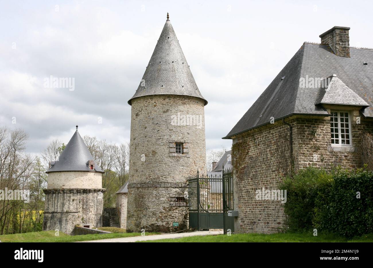 A view of the old medieval towers at Chateau de Canisy in the village of Canisy, Normandy, France, Europe Stock Photo