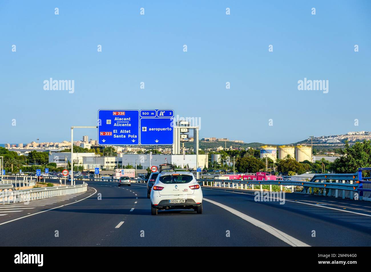 Tourist point of view of a Spanish road leading from Alicante city to Elche beach. Cars drive in