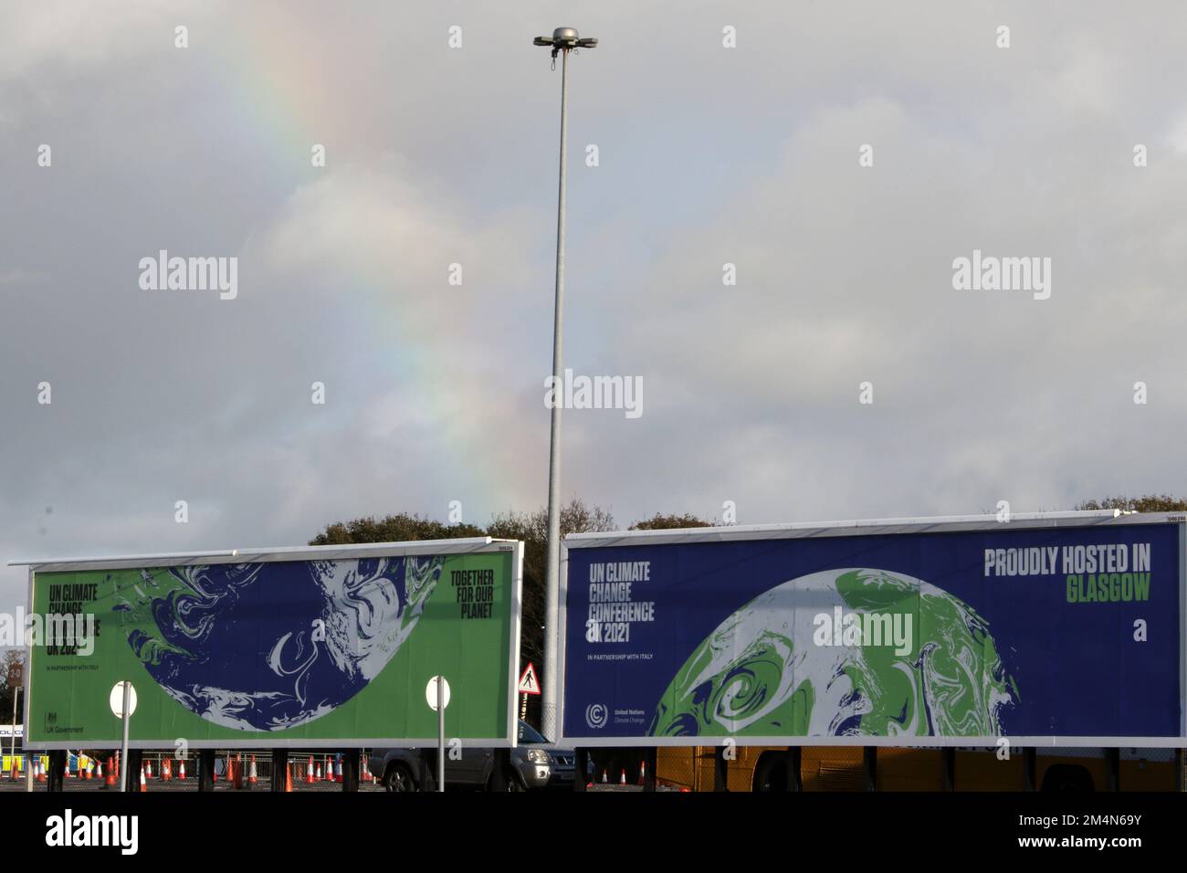 Glasgow Prestwick Airport, Prestwick, Ayrshire, Scotland, UK. Image shows large advertising hoarding promoting the UK Climate Change conference being held in Glasgow 2021. Known as COP 26. Stock Photo