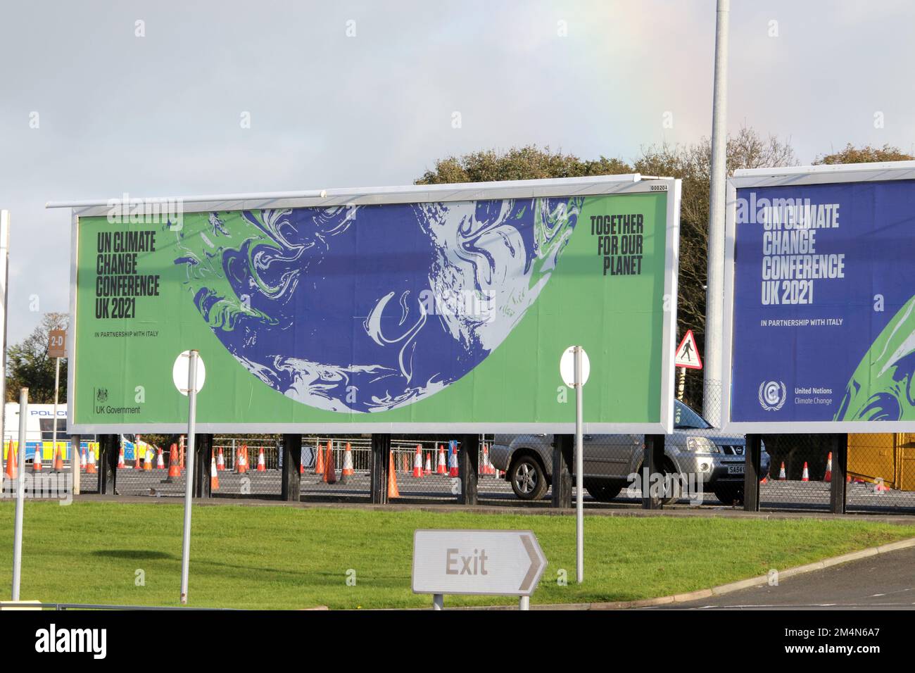 Glasgow Prestwick Airport, Prestwick, Ayrshire, Scotland, UK. Image shows large advertising hoarding promoting the UK Climate Change conference being held in Glasgow 2021. Known as COP 26. Stock Photo
