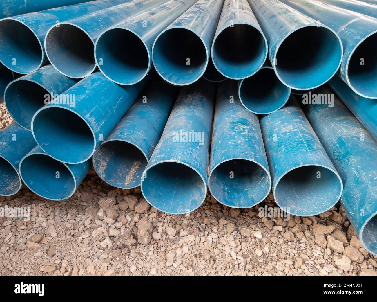 Closeup of the new PVC pipe pile near the construction site for the preparation of the water