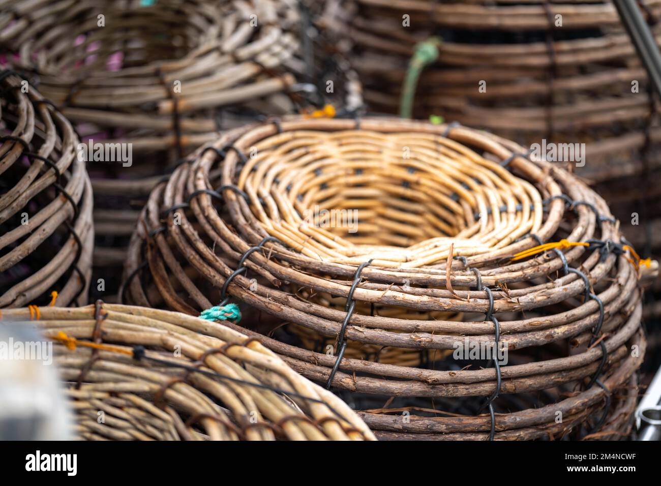 crayfish traps on a fishing boat. lobster wooden pots on the back of a ...