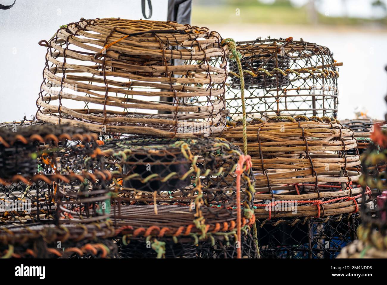 crayfish traps on a fishing boat. lobster wooden pots on the back of a  fishing ship in australia in fishing season Stock Photo - Alamy