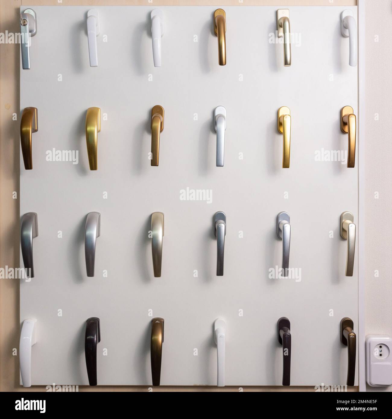 Stand with a large selection of handles for interior doors and plastic ...