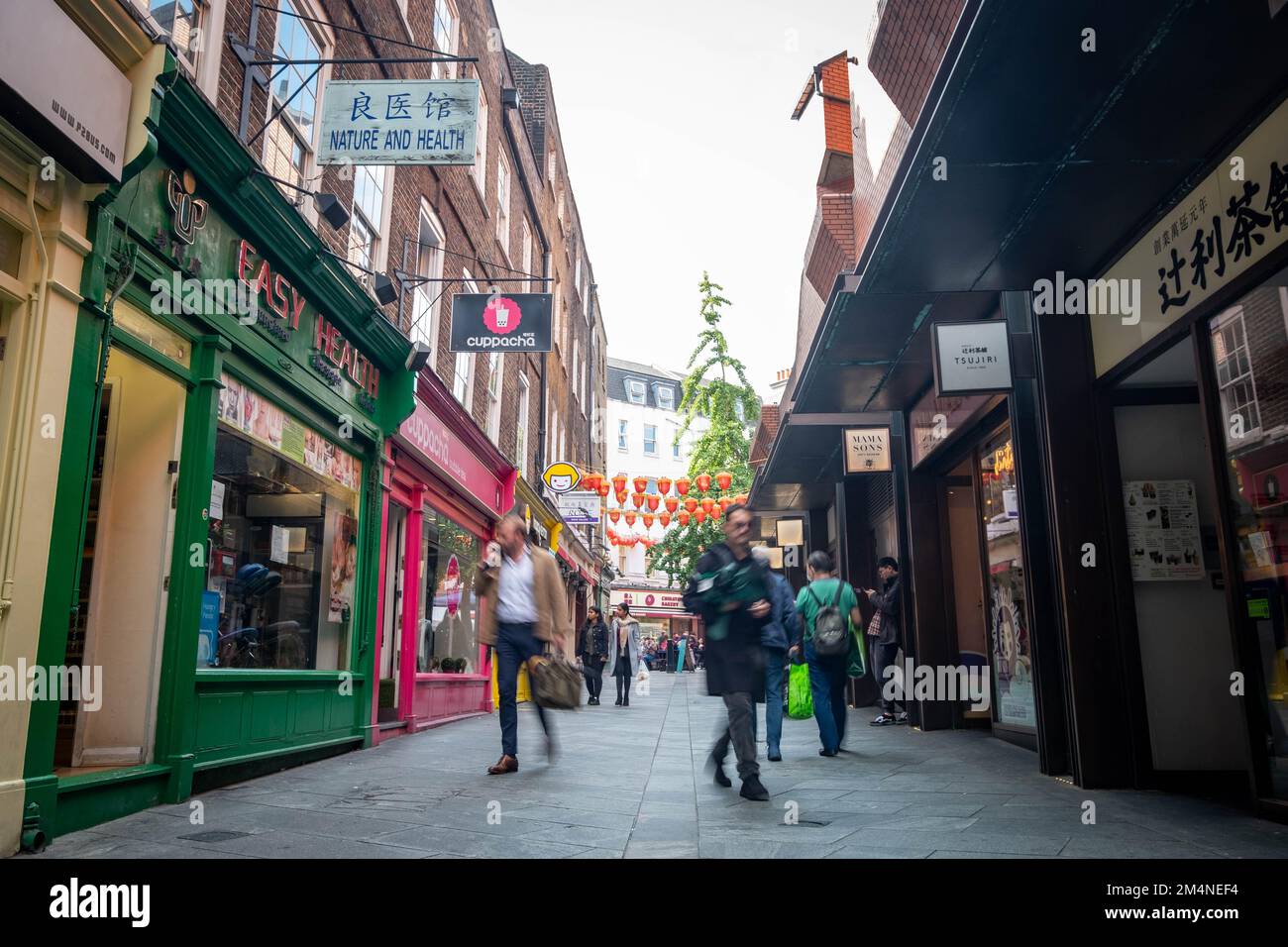 London- September 2022: Crowds of people in London's China Town area of Soho in the west end. Stock Photo
