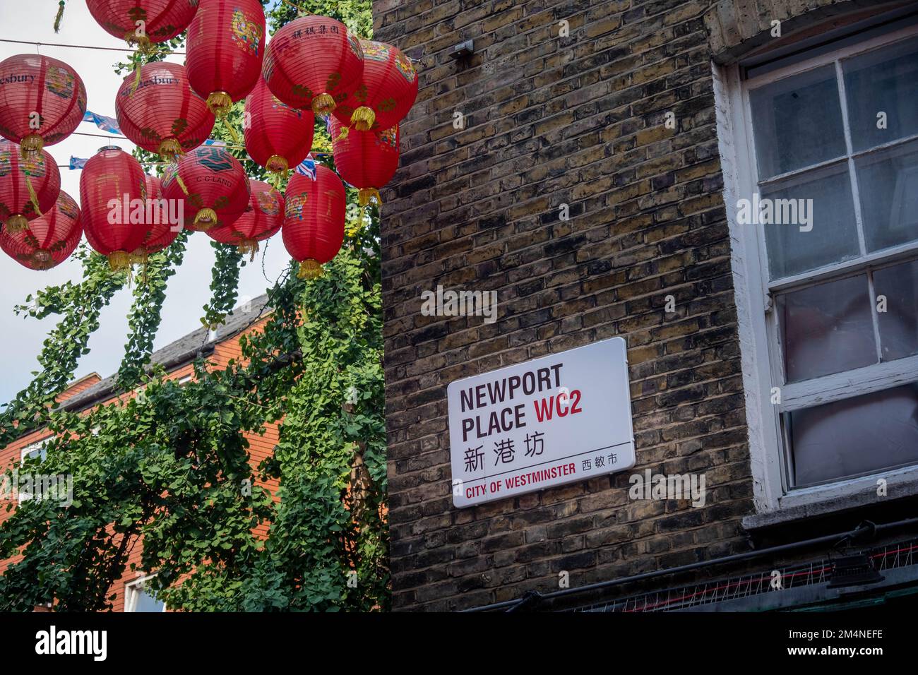London- September 2022: Newport Place street sign in London's China Town area of Soho in the west end. Stock Photo