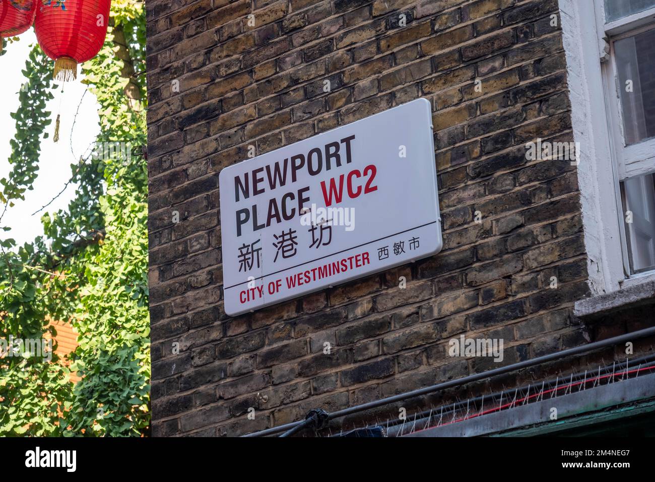 London- September 2022: Newport Place street sign in London's China Town area of Soho in the west end. Stock Photo