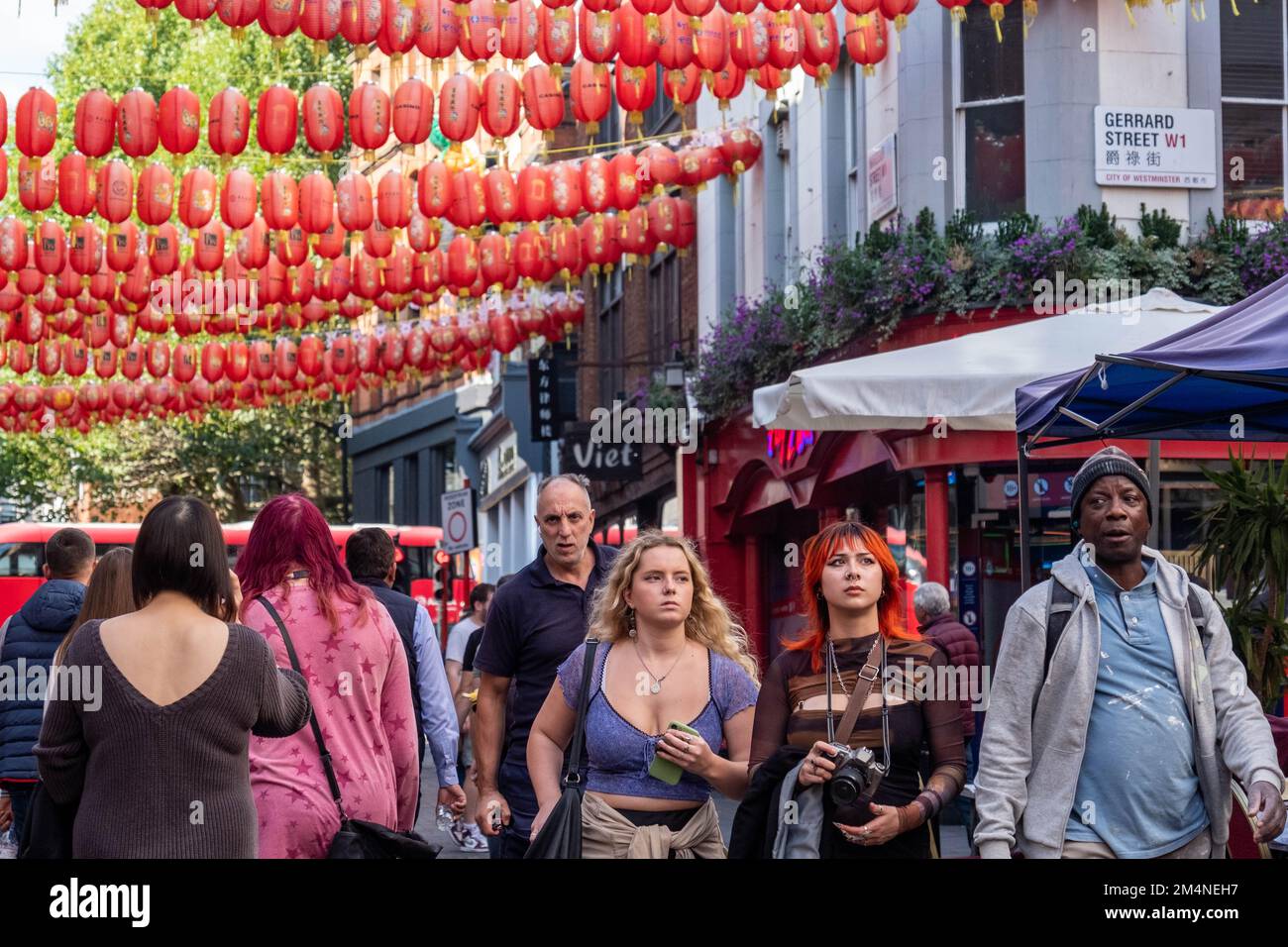 London- September 2022: Crowds of people in London's China Town area of Soho in the west end. Stock Photo