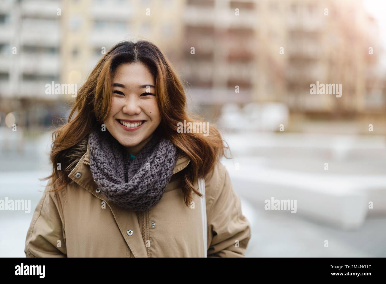 Portrait of young woman in the city Stock Photo