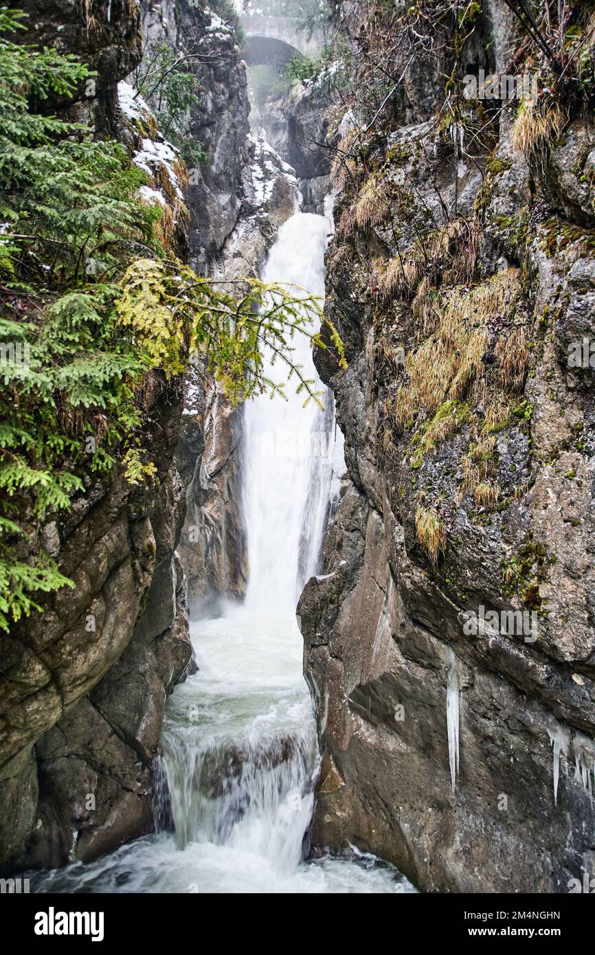 A vertical shot of the beautiful Tatzelwurm waterfall found in Bavaria, Germany Stock Photo